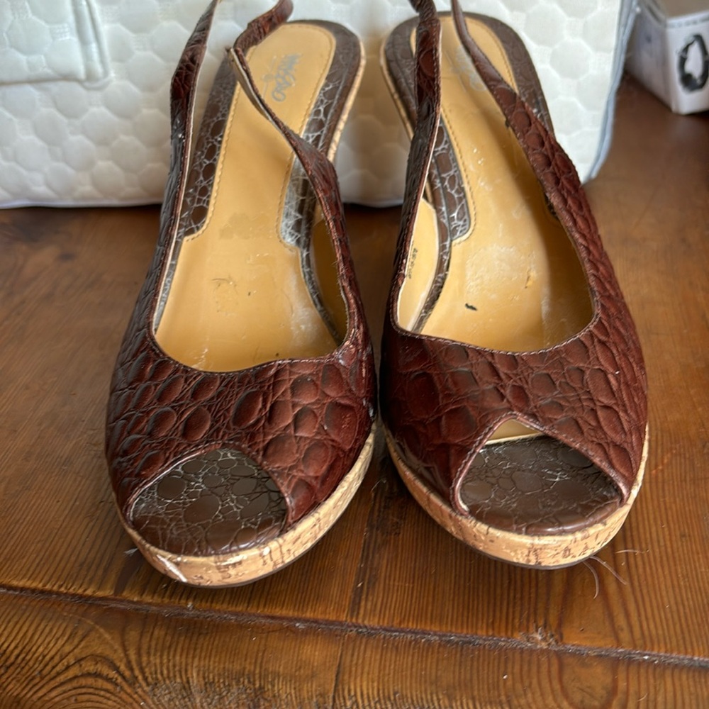 Mossimo Brown leather wedge sandals.